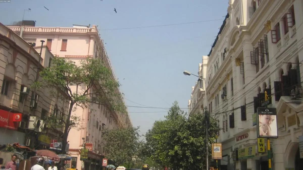 Indian city skyline with construction cranes representing real estate growth